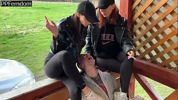 Hot Two Smoking Bitchy Girls Use Submissive Guy Like A Human Ashtray and Human Spittoon Slave On Public warm Videos